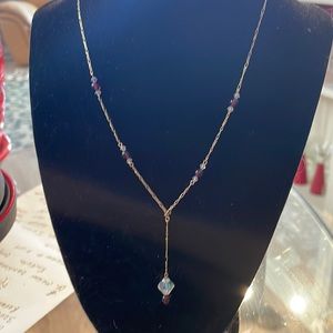 14carat gold chain with multicolored stone that shines! Very dainty. Statement!!